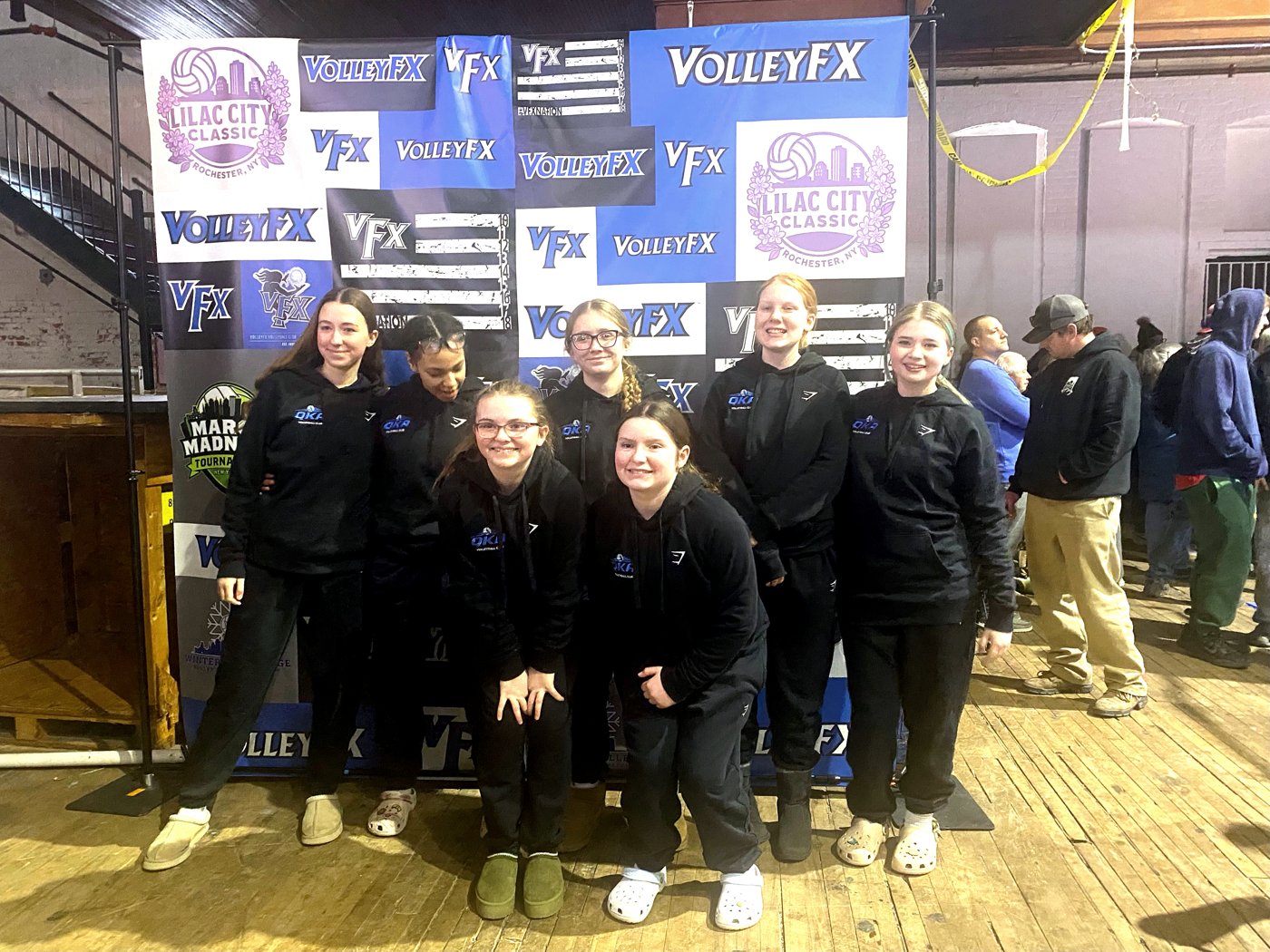 14U team in QKA hoodies at a tournament