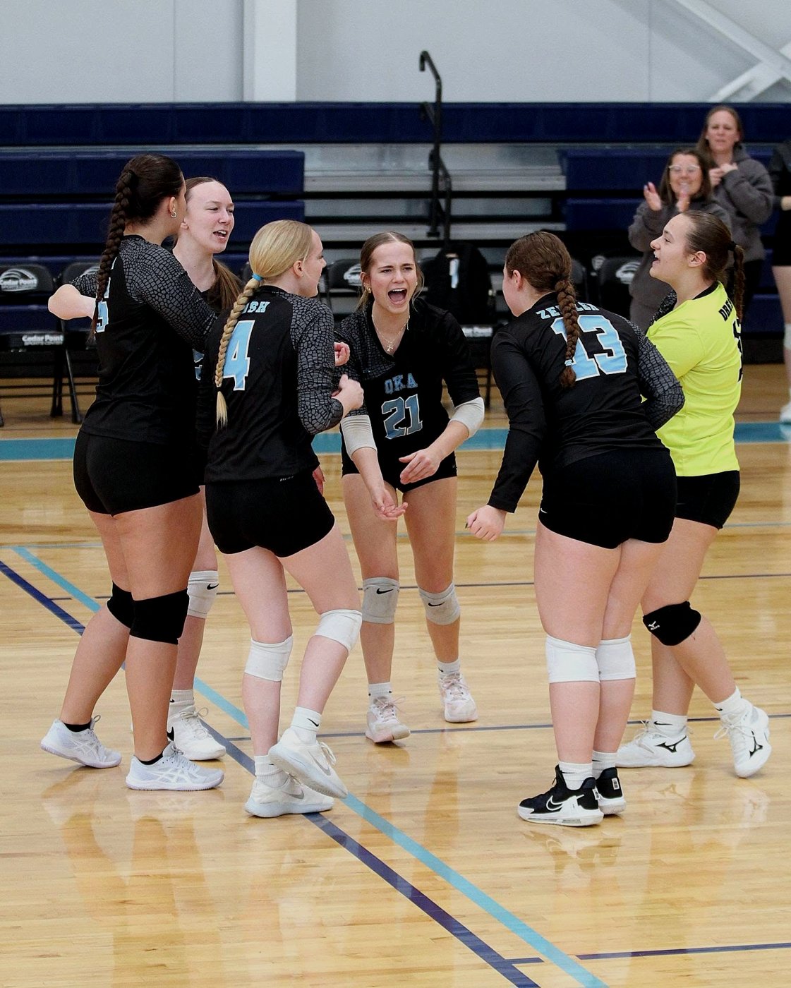 18U team celebrating a point